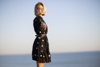 Selective Focus Photography of Standing Woman in Black Dress Near Outdoor