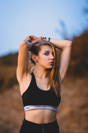 Selective Focus Photography of Standing Woman Wearing Black Calvin Klein Sports Bra