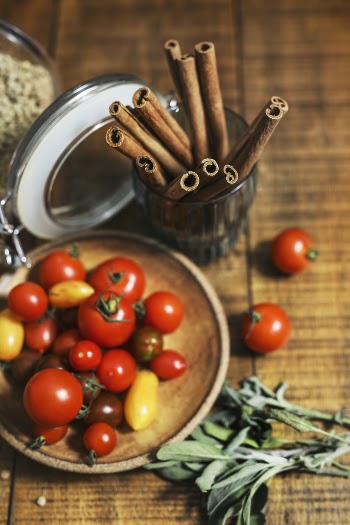 Selective Focus Photography of Tomatoes on Brown Plate