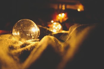 Selective Focus Photography of Turned on Halogen Light Bulb