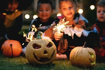 selective focus photography of two Jack-O-Lantern pumpkin decors