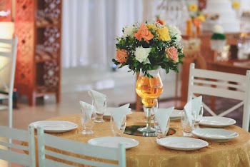 Selective Focus Photography of Vase With Flowers on Table