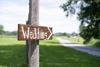 Selective Focus Photography of Wedding Wooden Sign