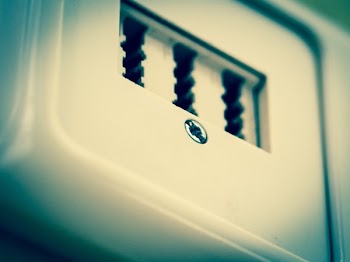 Selective Focus Photography of White Adapter