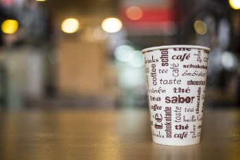 Selective-focus Photography of White and Brown Coffee Cup on Brown Wooden Surface