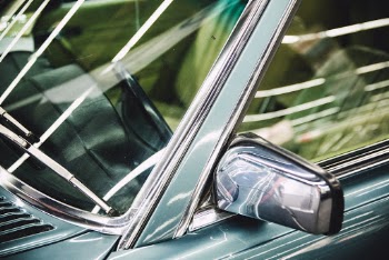 Selective Focus Photography of Wing Mirror