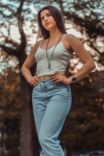 Selective Focus Photography Of Woman Both Arms On Waist