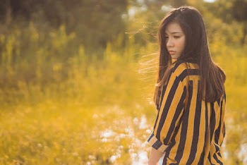 Selective Focus Photography Of Woman In A Field 