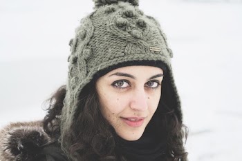 selective focus photography of woman in gray knitted hat