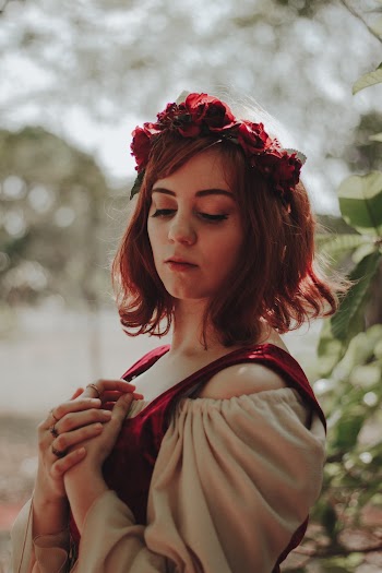 Selective Focus Photography of Woman in Red and Beige Off-shoulder Top
