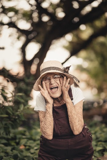 Selective Focus Photography of Woman Making Shout Post