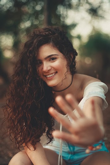 Selective Focus Photography of Woman Showing Her Left Hand