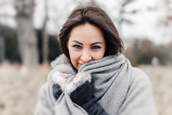 Selective Focus Photography of Woman Standing Near Trees