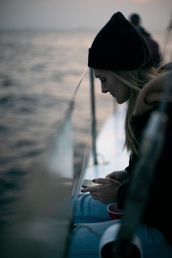 Selective Focus Photography of Woman Using Smartphone