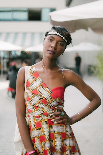 Selective Focus Photography of Woman Wearing A Printed Off-shoulder Dress