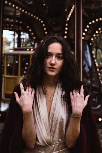 Selective Focus Photography of Woman Wearing Black Coat