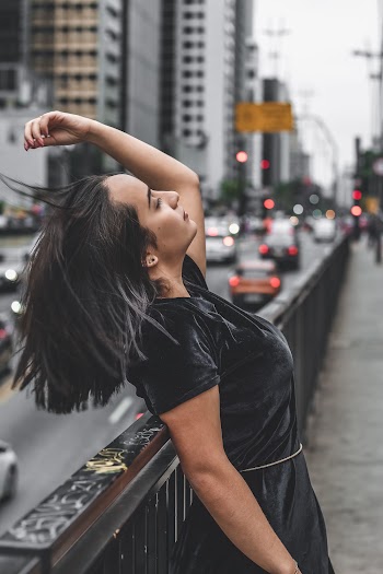 Selective Focus Photography Of Woman Wearing Black Dres
