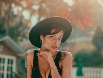 Selective Focus Photography of Woman Wearing Black Hat