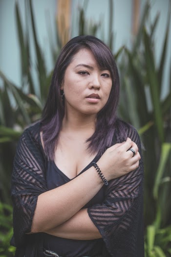 Selective Focus Photography Of Woman Wearing Black Top