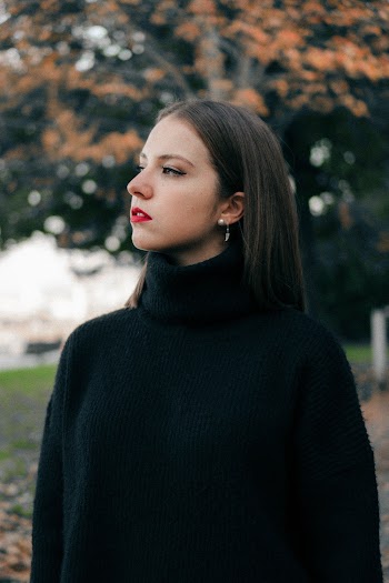 Selective Focus Photography of Woman Wearing Black Turtleneck Top