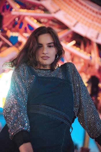 Selective Focus Photography of Woman Wearing Blue and Silver Long-sleeved Dress