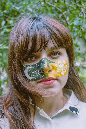 Selective Focus Photography of Woman Wearing Face Paint