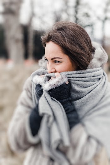Selective Focus Photography of Woman Wearing Gray Scarf