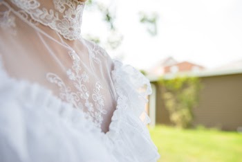 Selective Focus Photography of Woman Wearing Lace Top