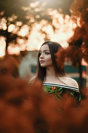 Selective Focus Photography of Woman Wearing Off-Shoulder