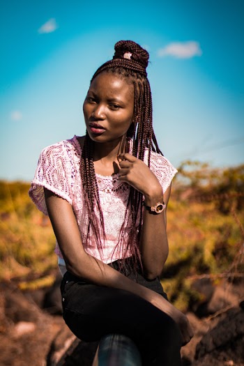 Selective Focus Photography of Woman Wearing Pink Lace Blouse