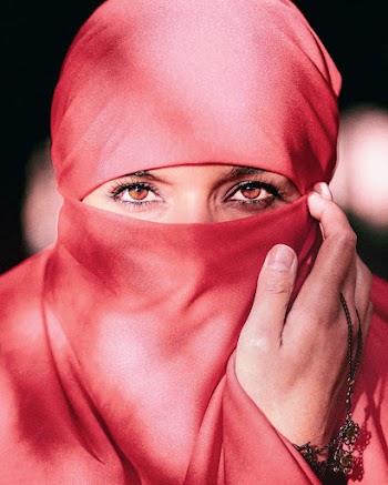 Selective Focus Photography Of Woman Wearing Red Hijab