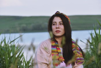 Selective Focus Photography of Woman Wearing Scarf