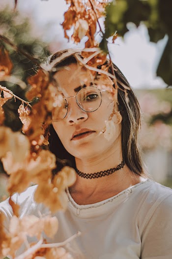 Selective Focus Photography of Woman Wearing White Shirt
