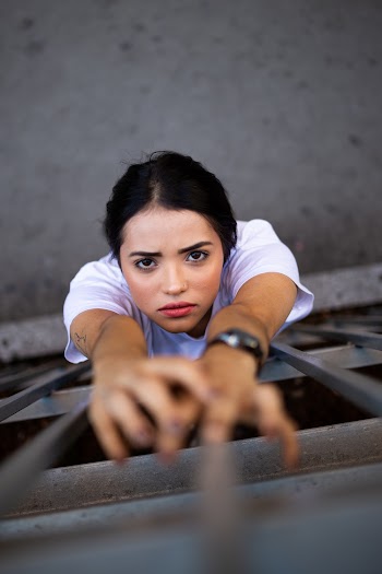 Selective Focus Photography of Woman Wearing White Top