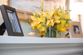 Selective Focus Photography Of Yellow Flowers Near Picture Frame