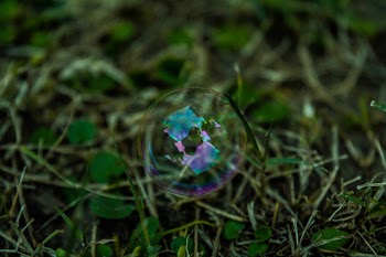 Selective Focus Photography or Iridescent Bubble