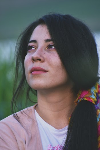 Selective Focus Portrait Photo of Woman Looking Up
