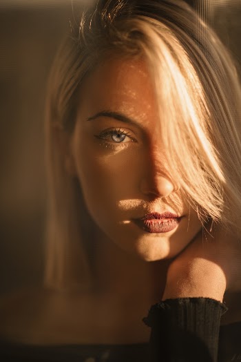 Selective Focus Portrait Photo of Woman Posing