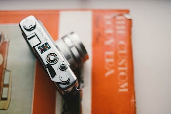 selective focus silver point-and-shoot camera