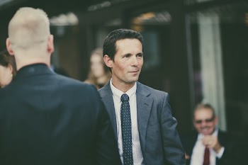 Selective Focused Photo of a Man Smiling