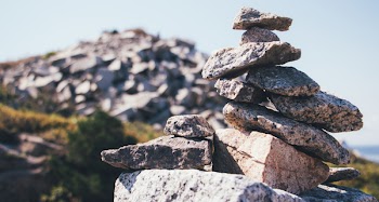 Selective Photo of Grey Stacked Stones