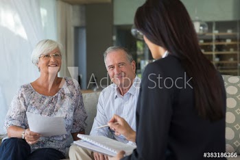 Senior couple meeting with financial advisor