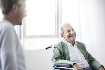 Senior man in wheelchair smiling. | Free Photo - rawpixel