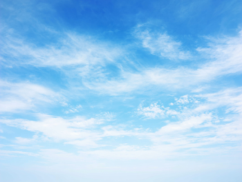 Serene Blue Sky with Wispy Clouds