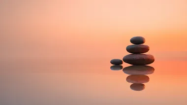 Serene Stacked Zen Stones at Sunrise