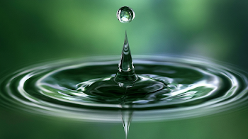 Serene Water Droplet with Conical Splash Spike