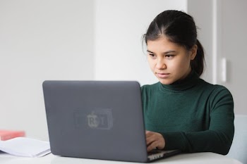 Serious Woman With Laptop
