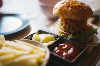 Serving of Burger With Potato Fries