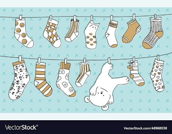 set of hand drawn socks hang on laundry string