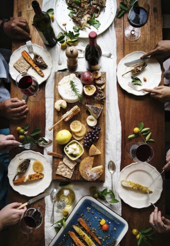 Several People Dining on Table